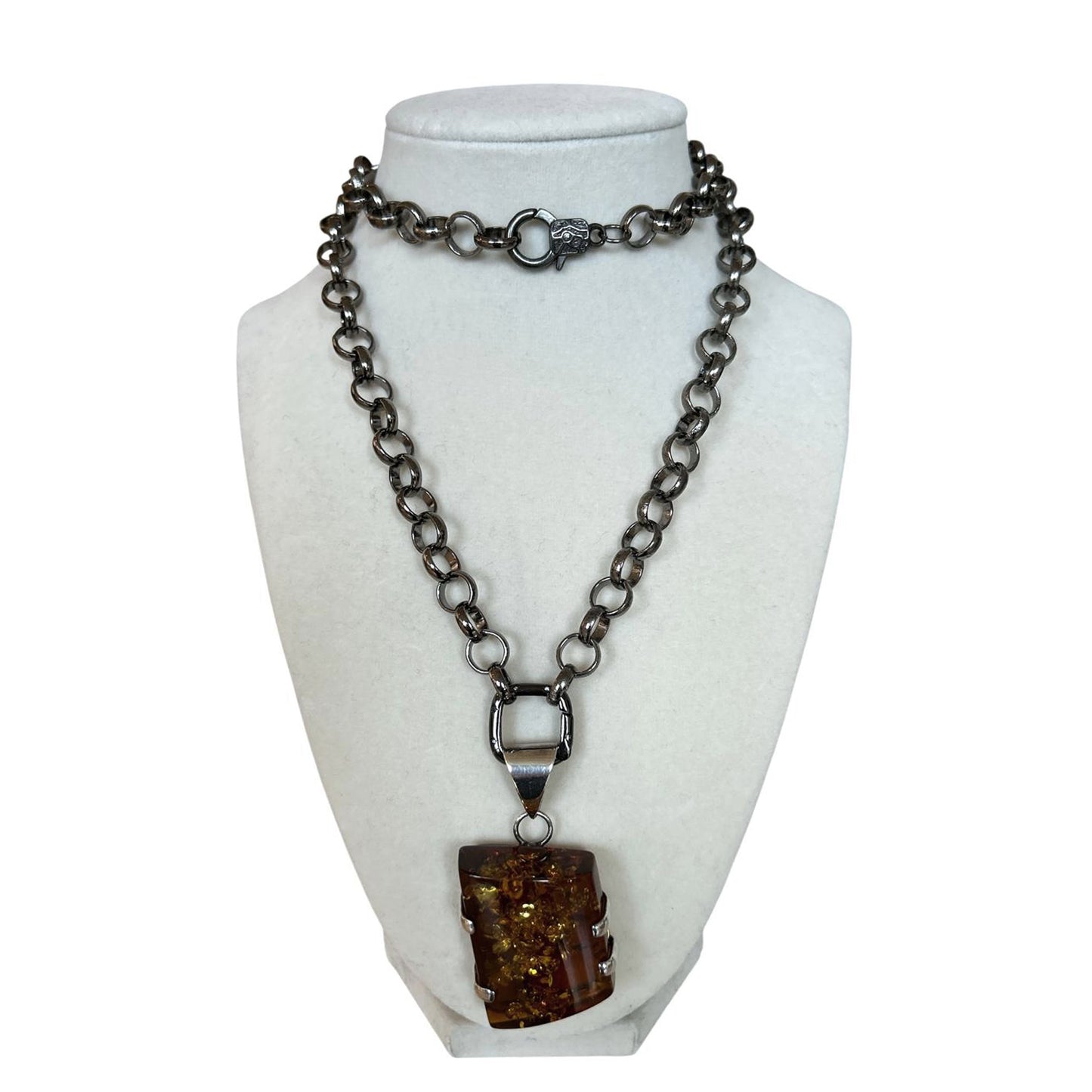 Amber pendant on a long blackened rolo chain Peggy Goodman Sold At Aqualta 2