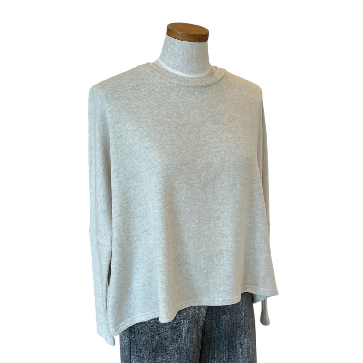 Flare cut Sweater Cream for women Neirami sold at Aqualta