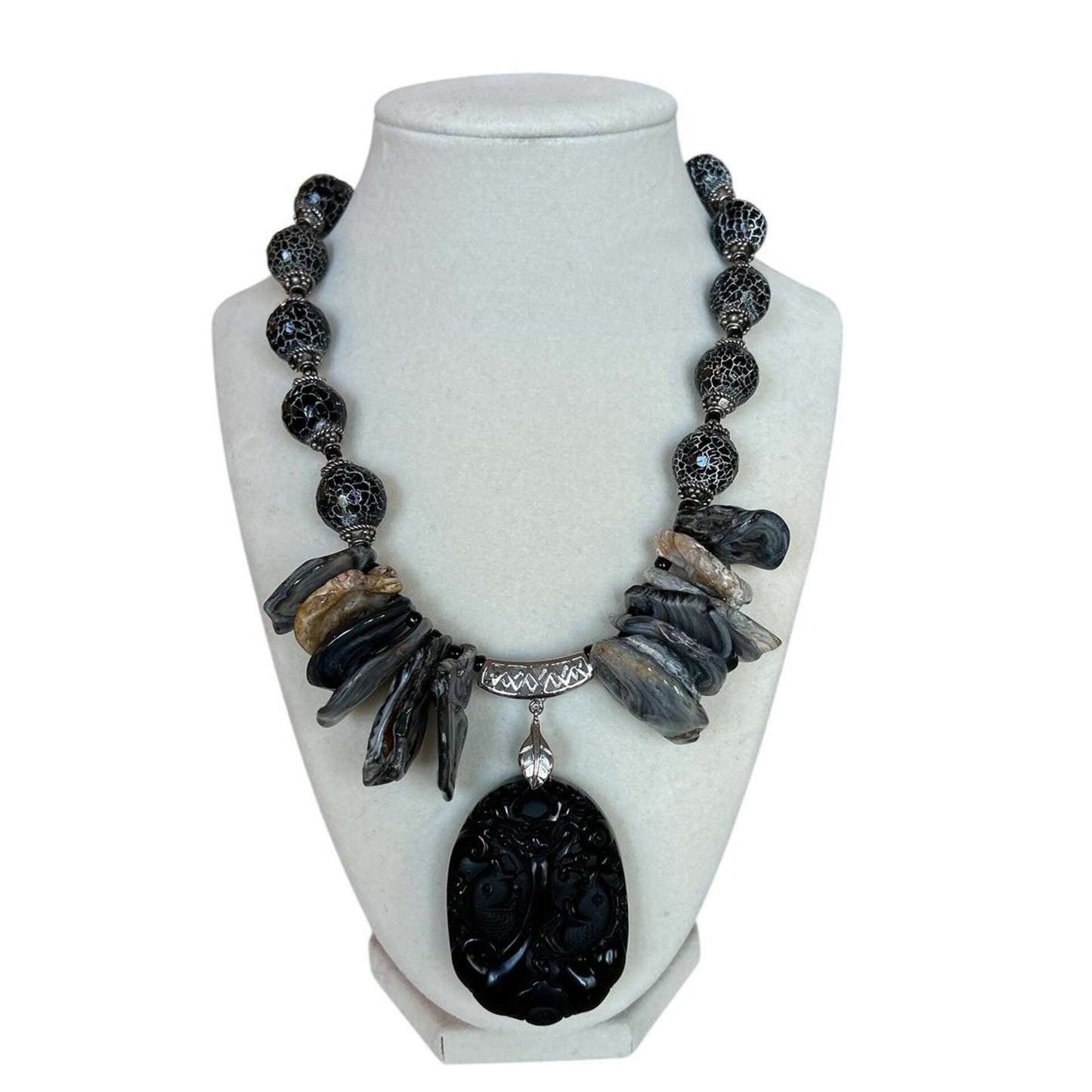 Exclusive Peggy Goodman statement necklace with obsidian pendant, natural stones, and silver accents, designed for Aqualta