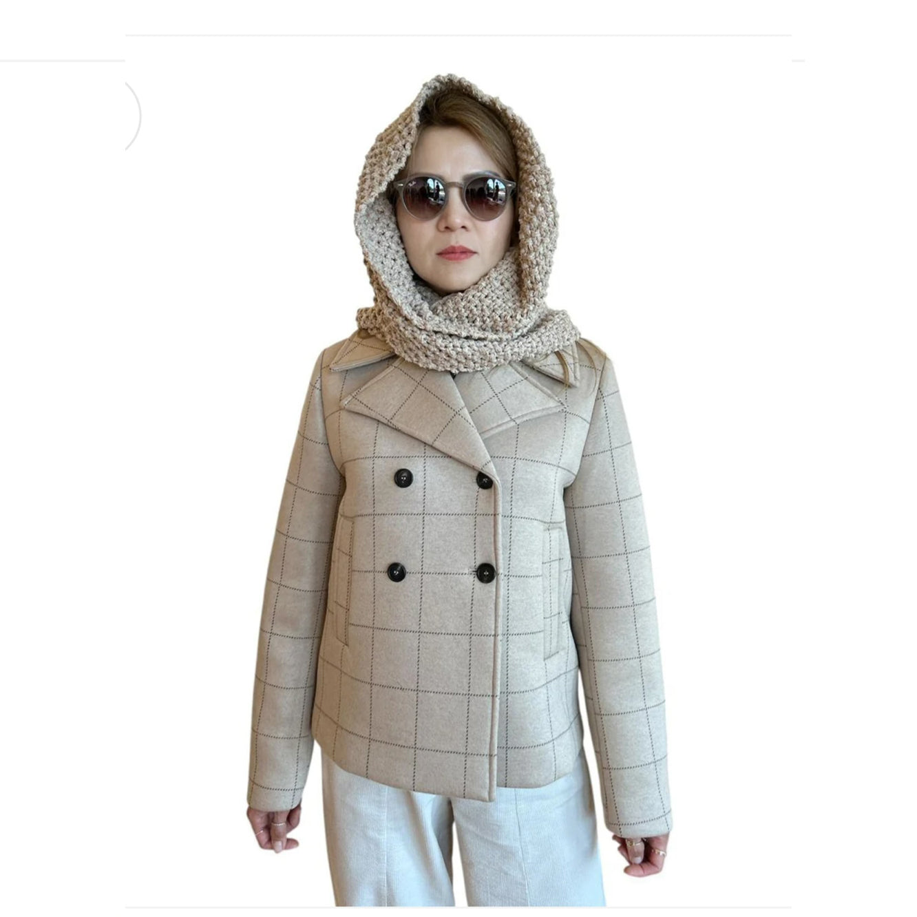 Person wearing a beige coat Goodmatch for women on a mannequin against a white background sold at Aqualta