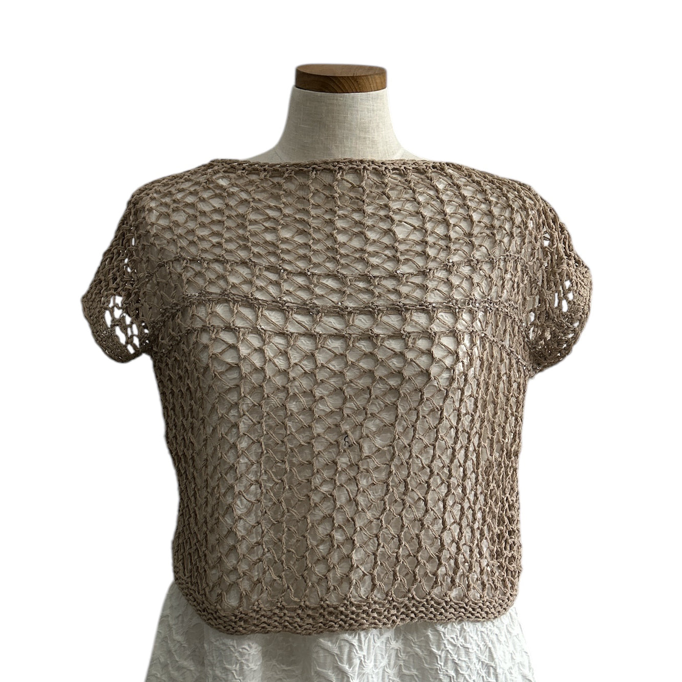 Handmade sand crochet knit top by Chiara Toffanin, made in Italy and available at Aqualta