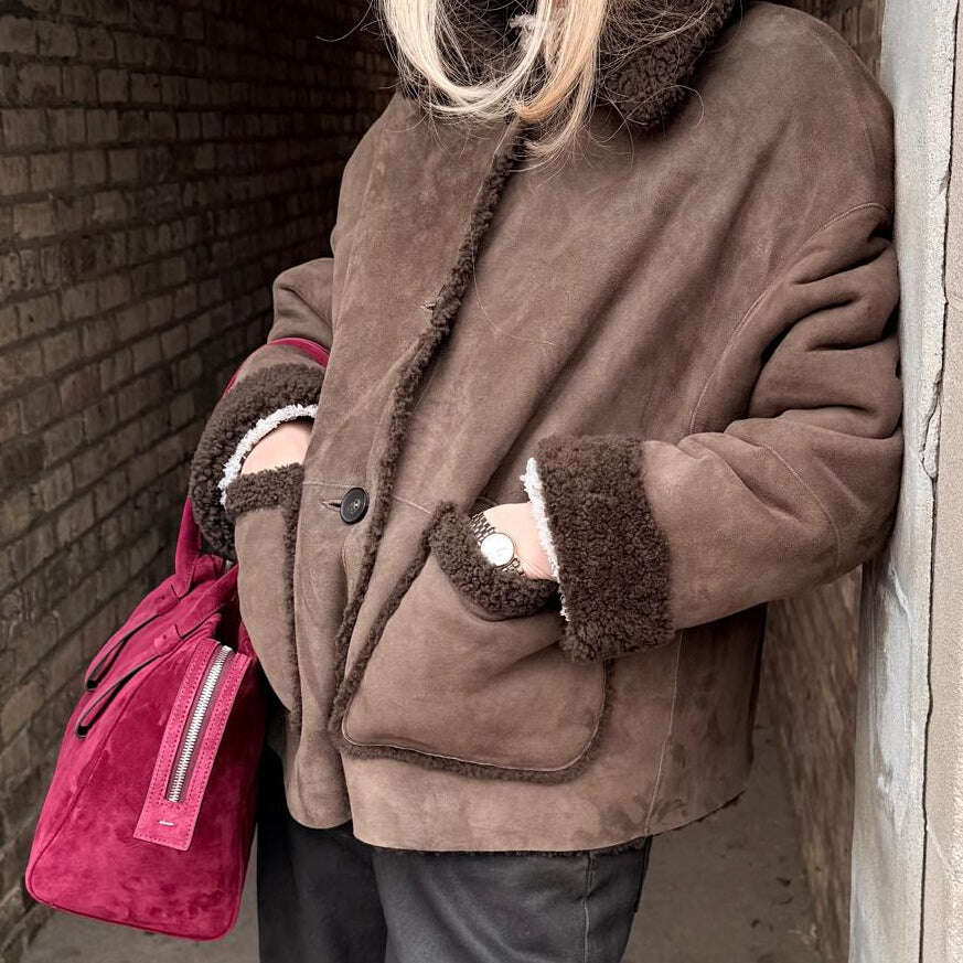 Luxury Suprma suede shearling jacket featuring a soft collar and front patch pockets, sold at AqualtaWear.