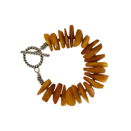 One of a kind amber bracelet by Peggy Goodman for Aqualta, handcrafted with genuine amber stones and sterling silver