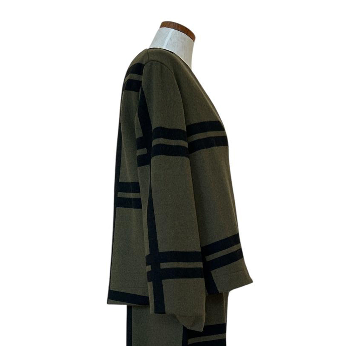 Side picture of Asymmetrical large Checks Jacket Neirami for women sold at Aqualta