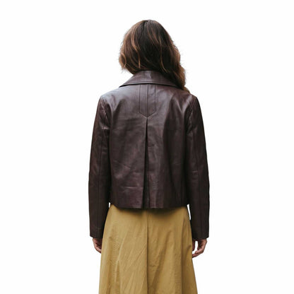 Women wearing a brown leather Suprema sold at Aqualta