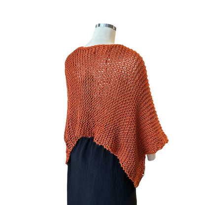 Back picture of our Sweater Batwing Crop top Orange Chiara Toffanin sold at Aqualta