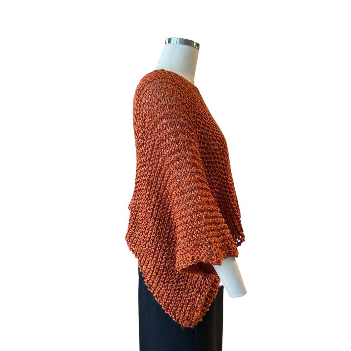 Side picture of our Sweater Batwing Crop top Orange Chiara Toffanin sold at Aqualta