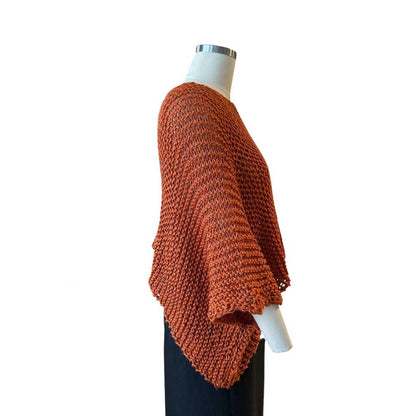 Side picture of our Sweater Batwing Crop top Orange Chiara Toffanin sold at Aqualta
