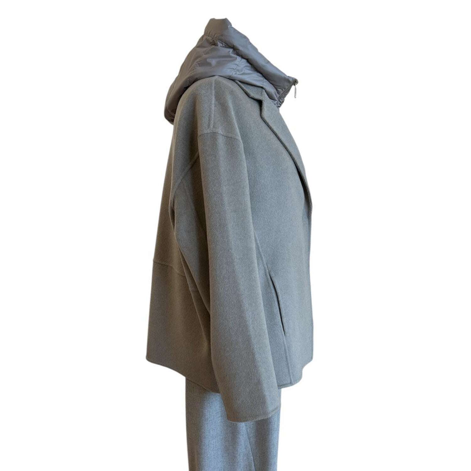 Side picture of our Beige Jacket with down Feather insert Suprema sold at Aqualta