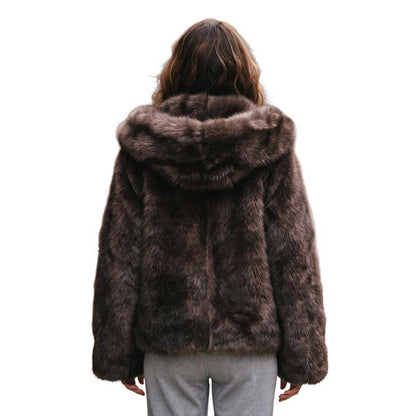 A person viewed from the back wearing a Brown Reversible shearling Jacket Suprema sold at Aqualta