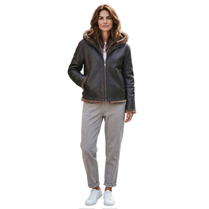A woman modeling a dark Brown Reversible shearling Jacket Suprema sold at Aqualta