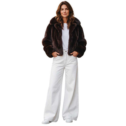 Woman wearing a Coated Off White Denim Flare cut Shaft Jean sold at Aqualta 5