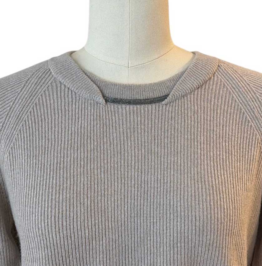 Women’s cream long-sleeve knitted sweater with decorative jeweled detail by Rocco Ragni at Aqualta 2