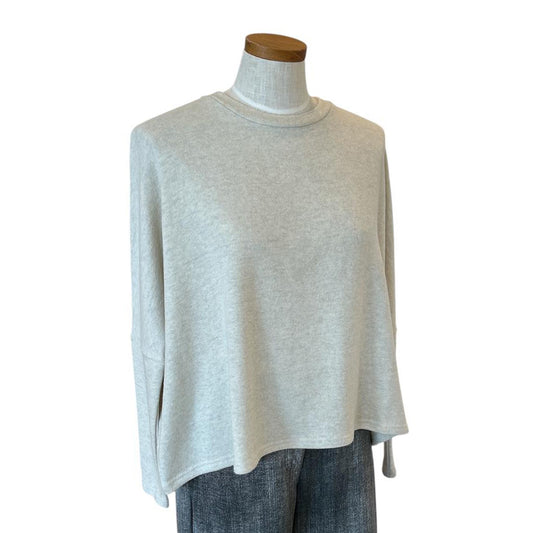 Flare cut Sweater Cream for women Neirami sold at Aqualta