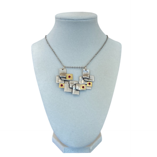 Geometric design Necklace with rubies and gold Pars Sold at Aqualta