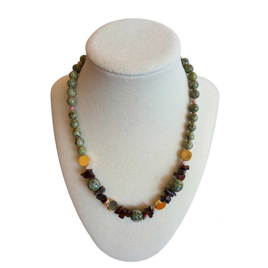 Green bead and burnt agate necklace by Peggy Goodman, sold at Aqualta.