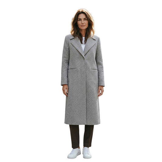 Woman wearing a Herringbone Cream Long Coat Goodmatch sold at Aqualta