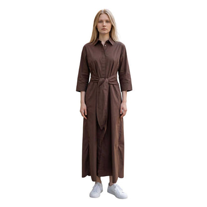 Woman wearing a Kimono Dress Brown Caliban sold ta Aqualta