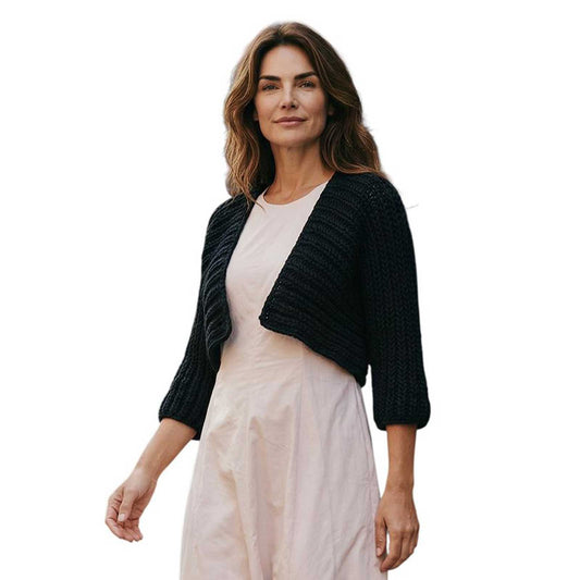 Woman wearing a Knit Shrug Black Chiara Toffanin sold at Aqualta