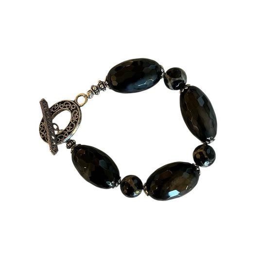 Exclusive Peggy Goodman bracelet featuring sterling silver accents, bead stones, and bold agate gems, designed for Aqualta