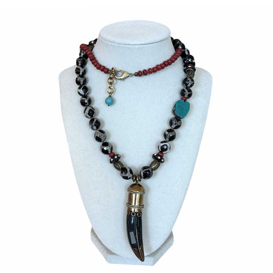 Long beads Necklace with horn pendant Peggy Goodman sold at Aqualta