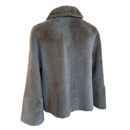 Back picture of our Merinos Jacket Laser Design Caramel Color Suprema sold at Aqualta