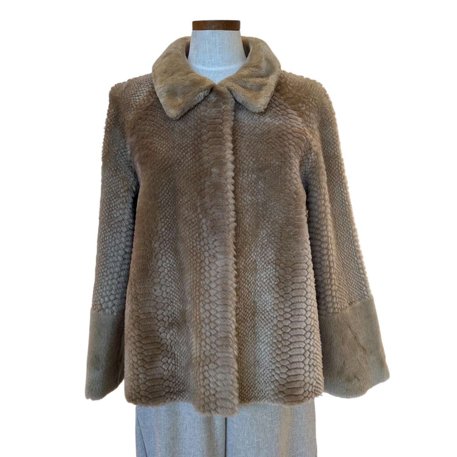 Front picture of our Merinos Jacket Laser Design Caramel Color Suprema sold at Aqualta