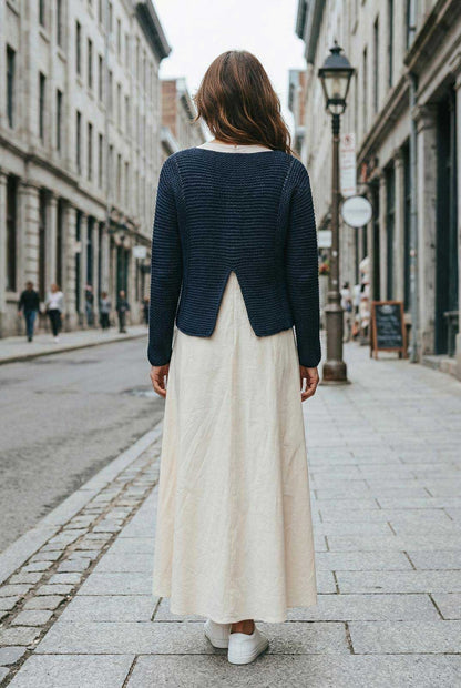 Woman walking down a city street wearing Front of Navy Knit Crop long sleeves Sweater Chiara Toffanin for women sold at Aqualta