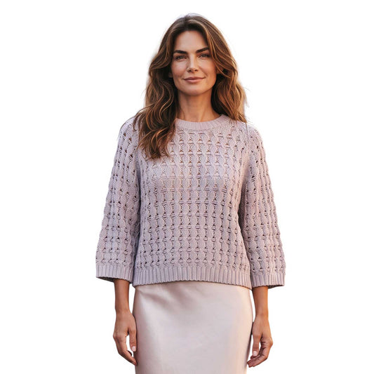 Women’s oatmeal round neck knitted sweater with subtle sparkles by Rocco Ragni, sold at Aqualta.