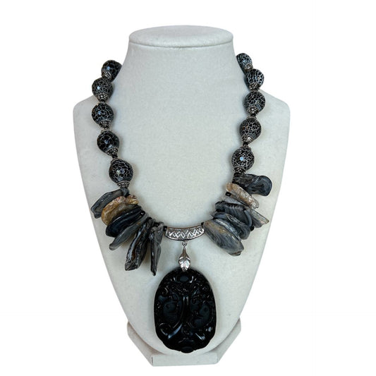 Exclusive Peggy Goodman statement necklace with obsidian pendant, natural stones, and silver accents, designed for Aqualta