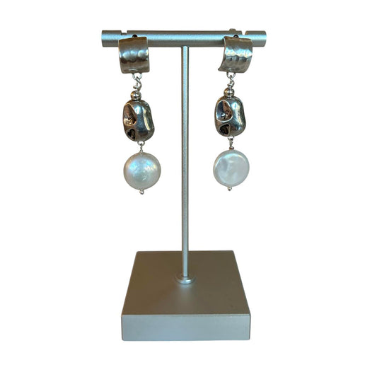 Handmade dangle earrings by Peggy Goodman for Aqualta, featuring hammered silver with natural white coin pearls