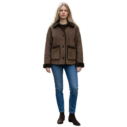Suprema reversible olive brown shearling suede jacket with cozy collar and front pockets, sold at AqualtaWear. 2