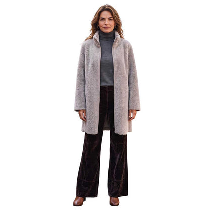 Suprema reversible Merinos fur and leather knee length coat sold at Aqualta
