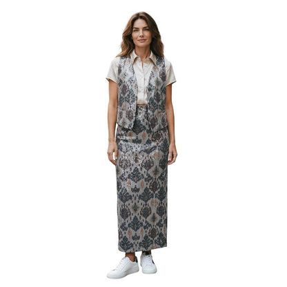 Woman wearing a floral Sequin motif Wrap Skirt Deluxe sold at Aqualta