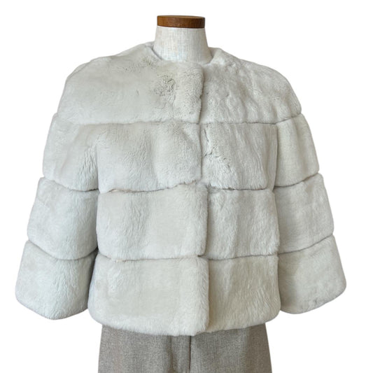 Front picture of our Short Rex Jacket Milk Suprema sold at Aqualta