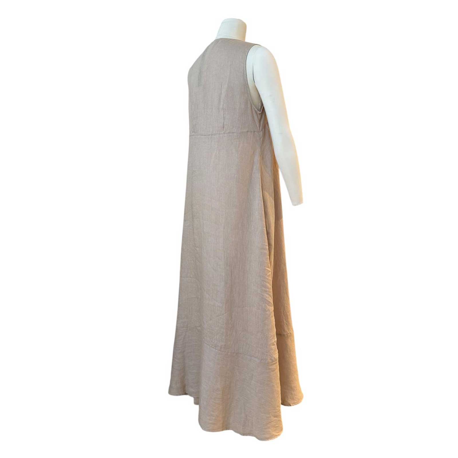 Woman wearing a Sleeveless long linen dress Sand Caliban Sold at Aqualta 3