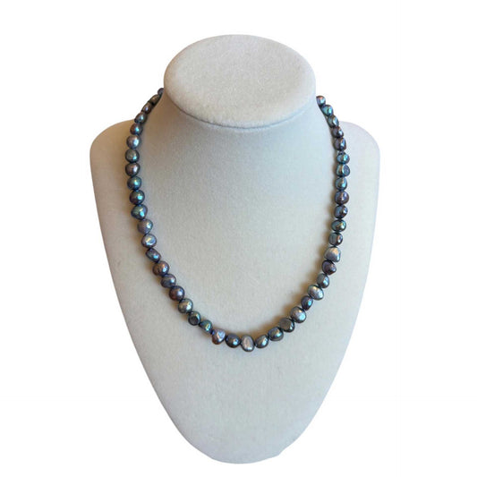 Small blue gray freshwater pearl necklace by Peggy Goodman, sold at Aqualta.