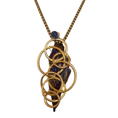 Tanzanite raw stone pendant on Necklace Pars sold at Aqualta 2