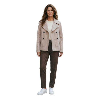 Woman wearing Plaid patterned coat on a mannequin against a white background Sold at Aqualta 2