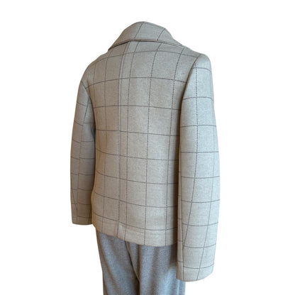 Back of Checkered coat Goodmatch for women on a mannequin against a white background sold at Aqualta