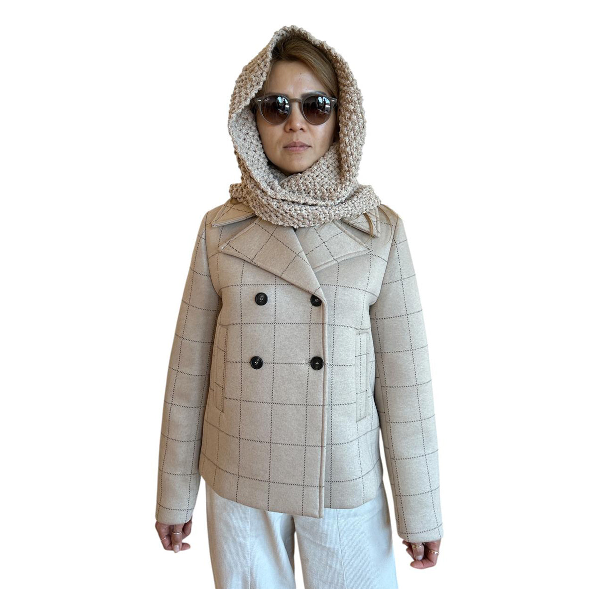 Person wearing a beige coat Goodmatch for women on a mannequin against a white background sold at Aqualta