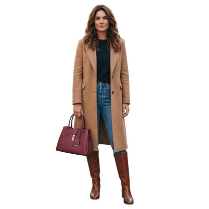 A woman wearing a Top Handle Leather Satchel Bag burgundy Biagini sold at Aqualta