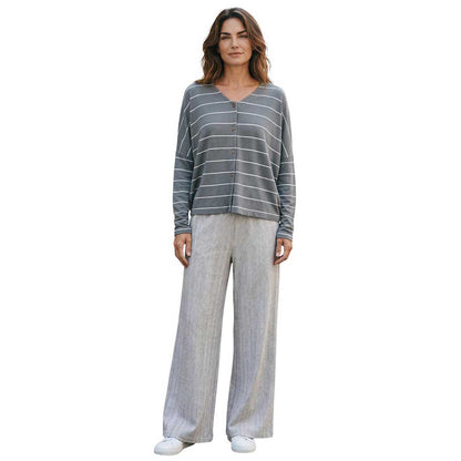 Woman wearing a gray striped long-sleeve top V-Neck Cardigan Stripes Neirami Sold at Aqualta 3