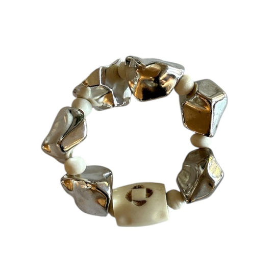 Exclusive Peggy Goodman bracelet featuring natural bone beads and sterling silver design, made for Aqualta