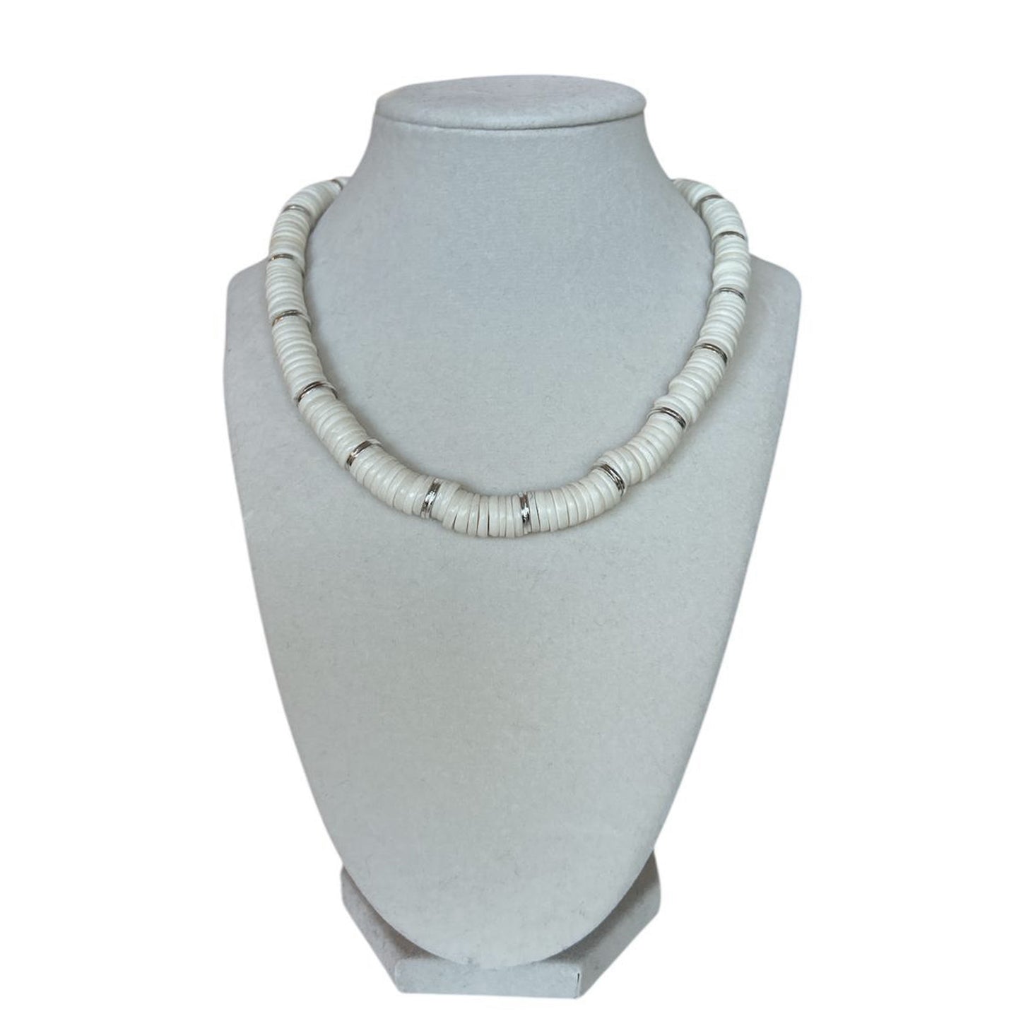 Handmade necklace by Peggy Goodman for Aqualta, featuring white freshwater coin pearls with sterling silver accents.