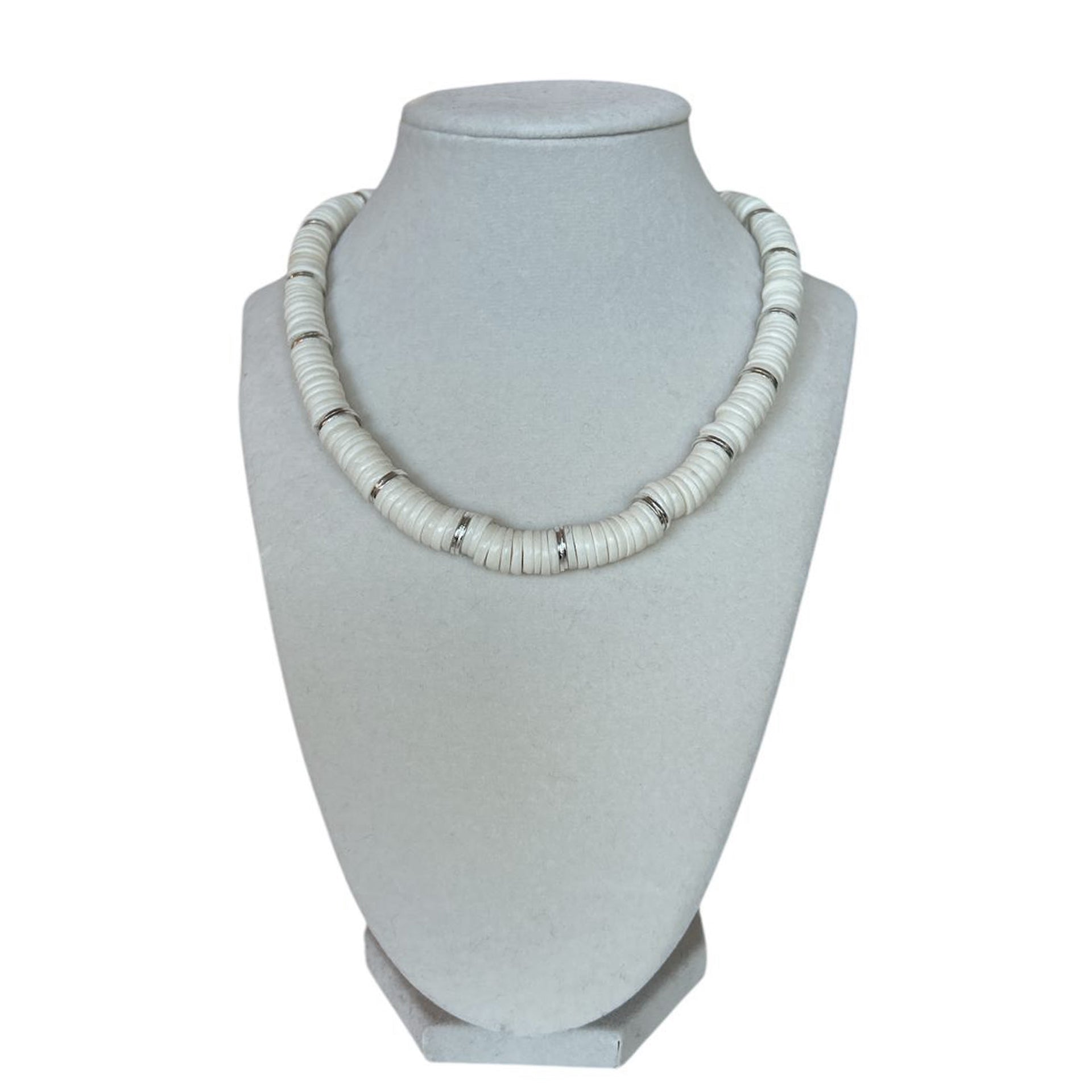 Handmade necklace by Peggy Goodman for Aqualta, featuring white freshwater coin pearls with sterling silver accents.