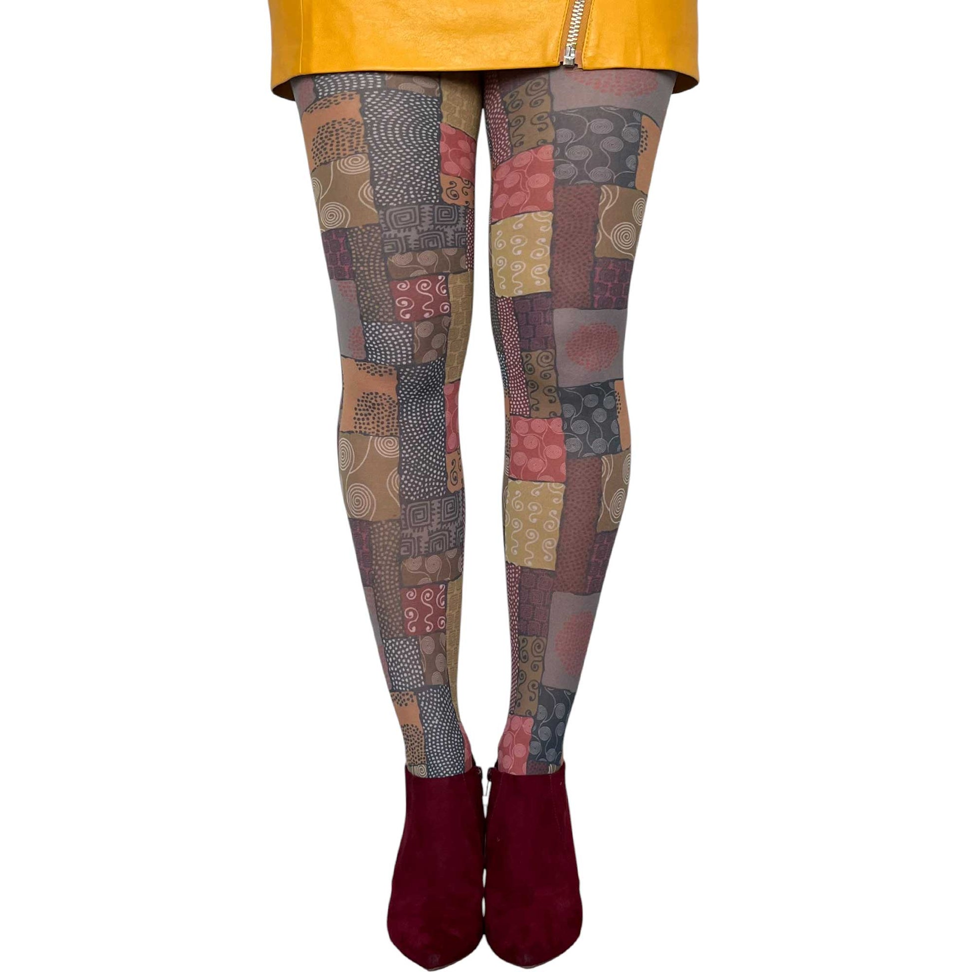 Multicolored patchwork tights featuring African-inspired art patterns and creative fashion aesthetic