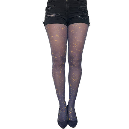 Women’s navy and gold star patterned tights shown with outfit styling