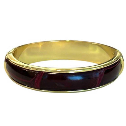 A simple classic Burgundy leather metal bangle, made with a crocodile over brass Biagini sold at Aqualta