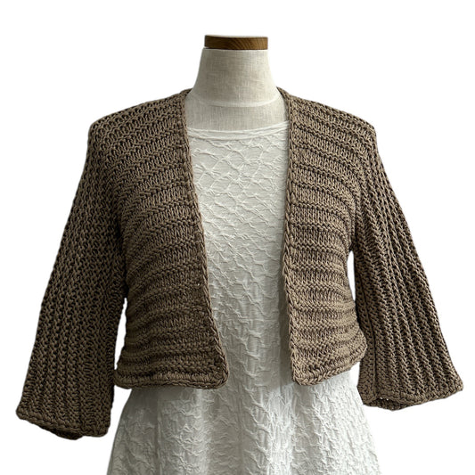 Lightweight sand-colored knit shrug by Chiara Toffanin, made in Italy and sold at Aqualta